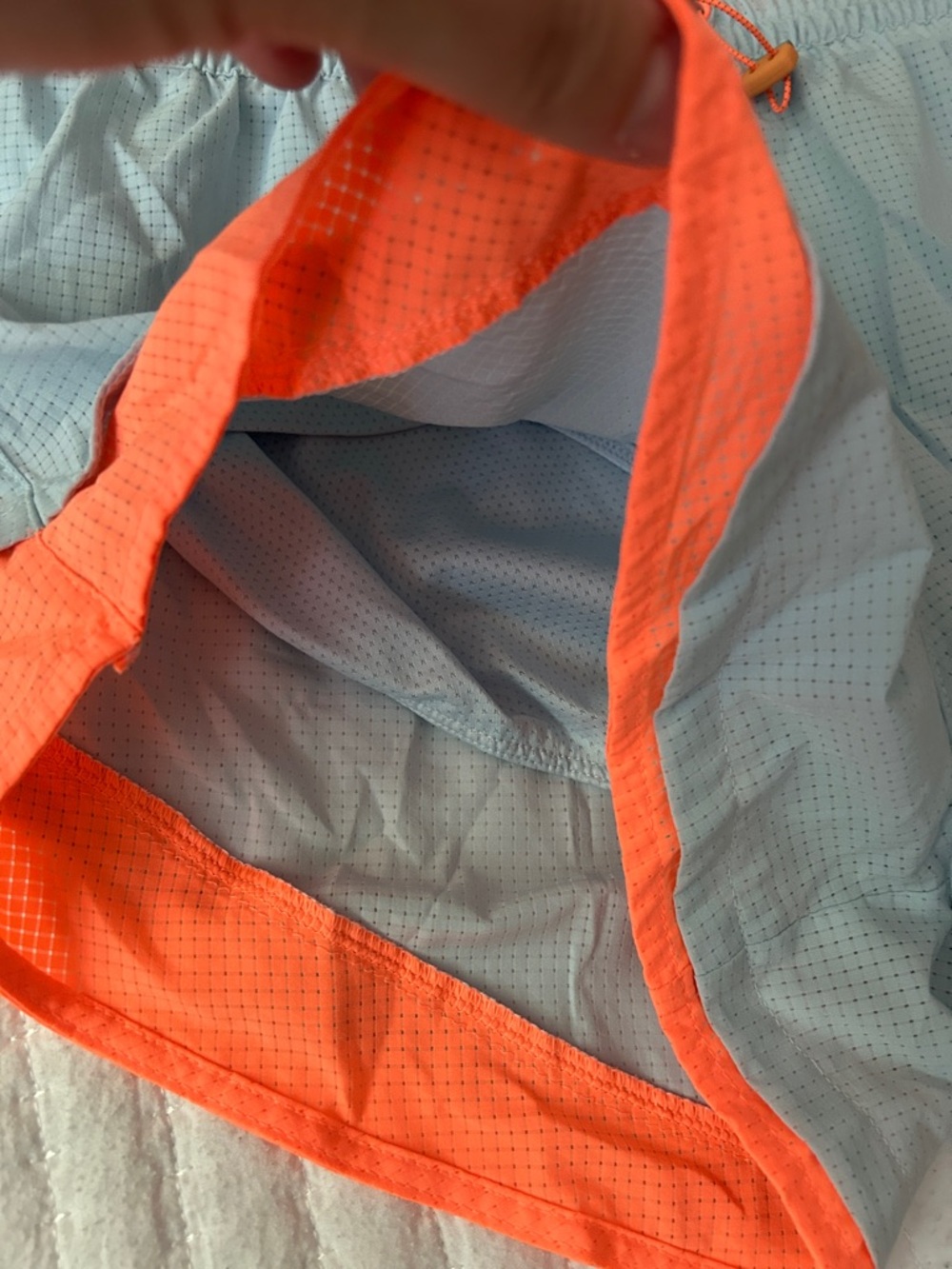 New Balance Light Blue Mesh Running Shorts with Orange Eyelets - Picture 8 of 8